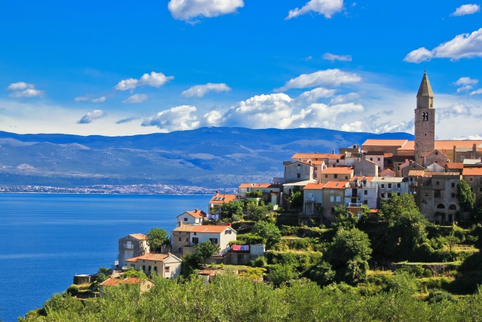 Adriatic-Town-of-Vrbnik-in-front-of-blue-sea,-Island-of-Krk,-Croatia_shutterstock_91707248.jpg